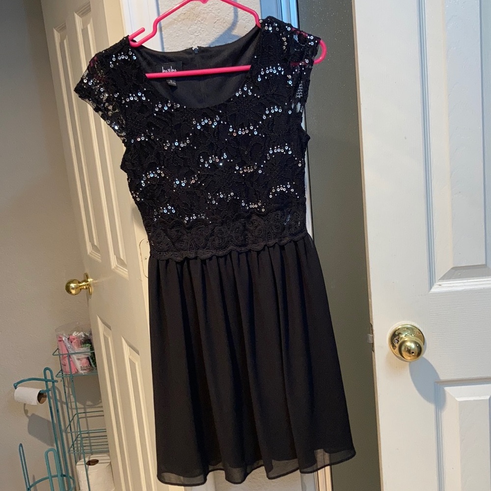 A black sparkly dress